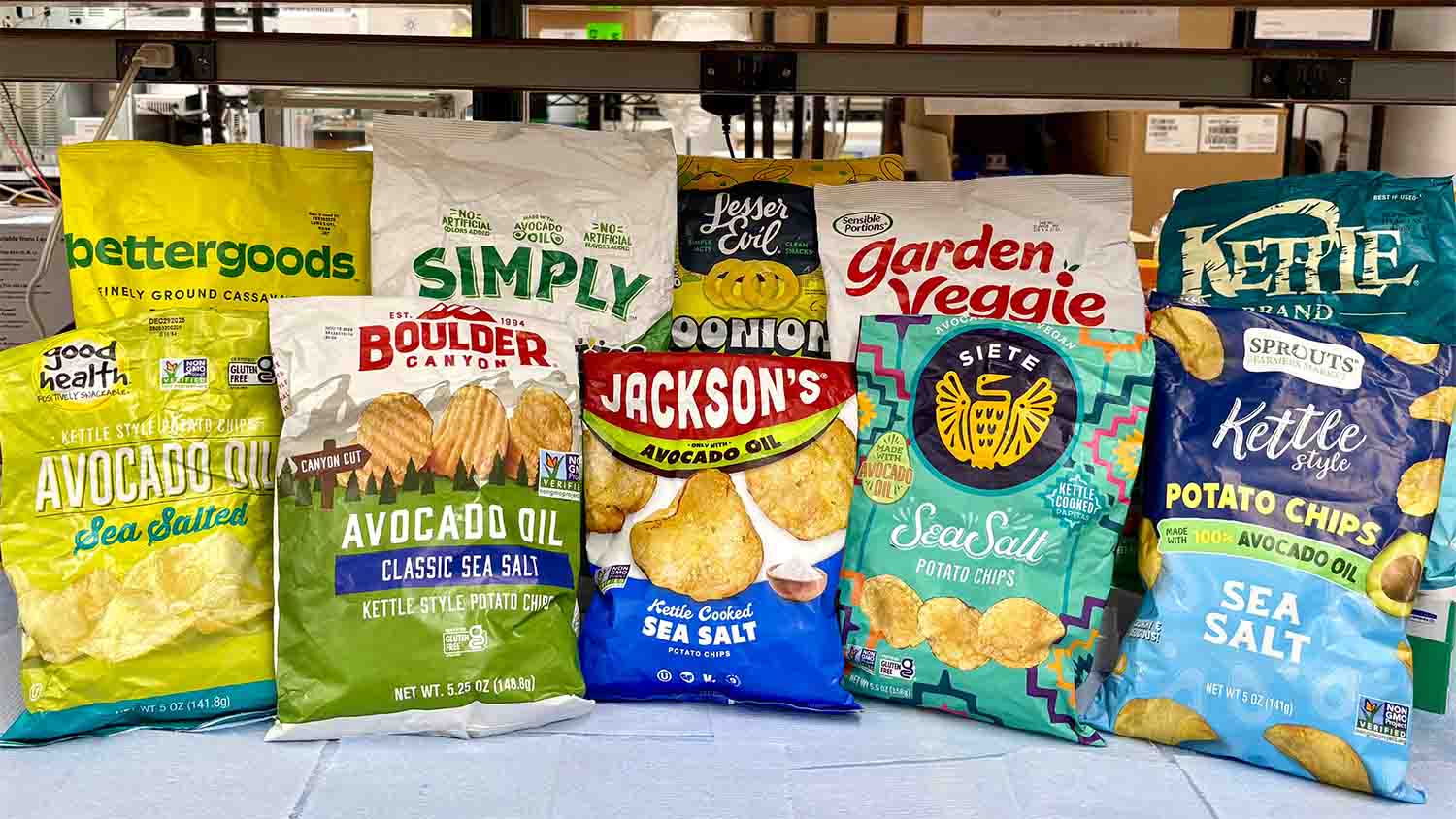 Ten bags of avocado oil potato and tortilla chips lined up on a lab bench at UC Davis before authenticity testing